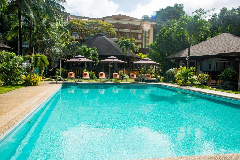 Bazén v ubytování El Nido Garden Resort nebo v jeho okolí