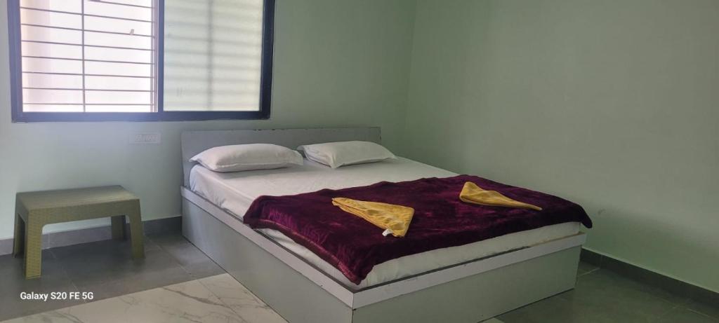 Letto o letti in una camera di Greenstone Resort Hampi