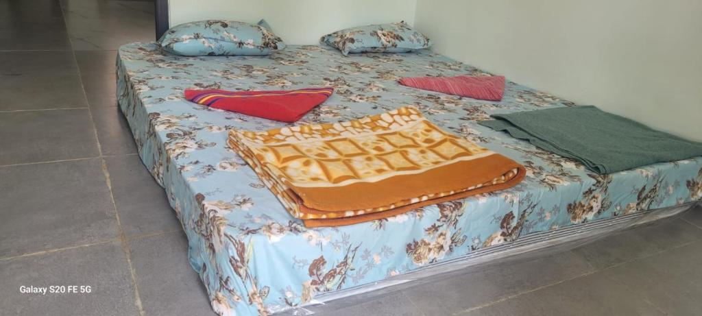 Letto o letti in una camera di Greenstone Resort Hampi