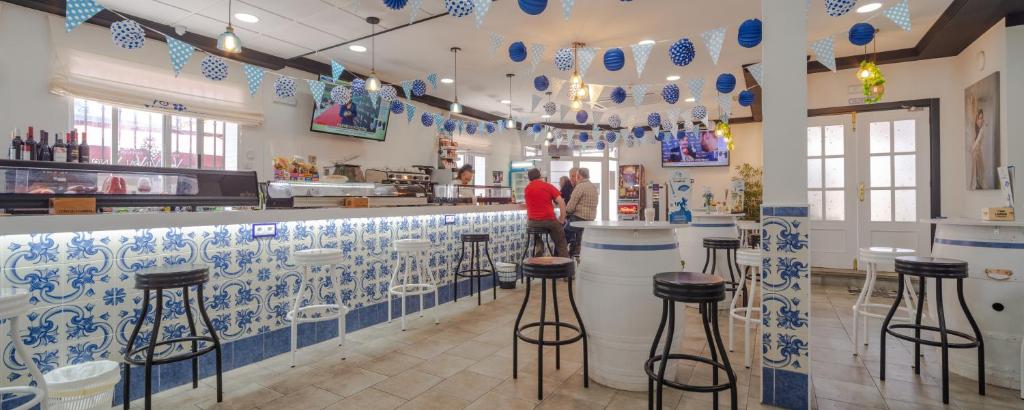 Reštaurácia alebo iné gastronomické zariadenie v ubytovaní Hostal Valdepeñas by Bossh Hotels
