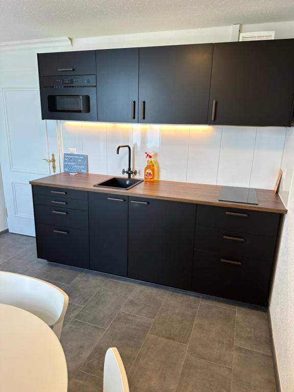 Kuchyň nebo kuchyňský kout v ubytování Lakeside Apartments Rorschach - easy self check-in