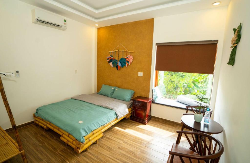 Giường trong phòng chung tại Tâm Family Homestay-Huế