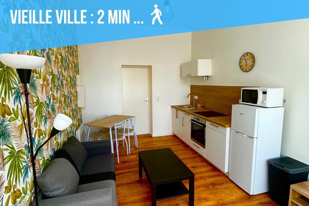 un piccolo appartamento con cucina e soggiorno di Le Ch'ti Cocon - Hyper centre - rdc - neuf a Boulogne-sur-Mer