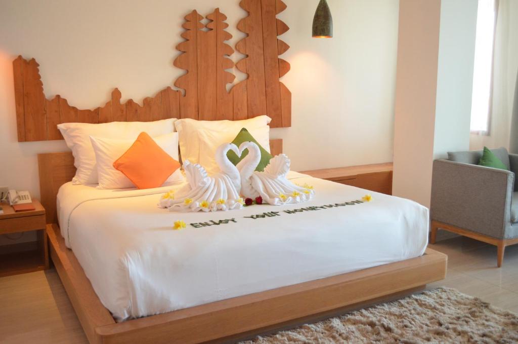 Postel nebo postele na pokoji v ubytování Hotel Nikko Bali Benoa Beach