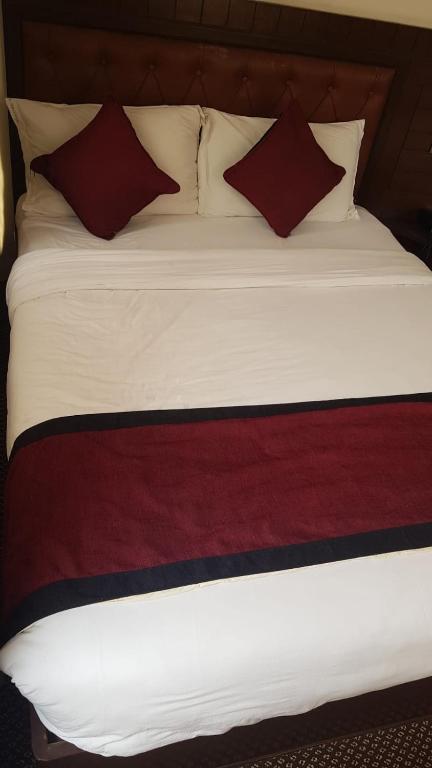 Postel nebo postele na pokoji v ubytování Hotel de Universal