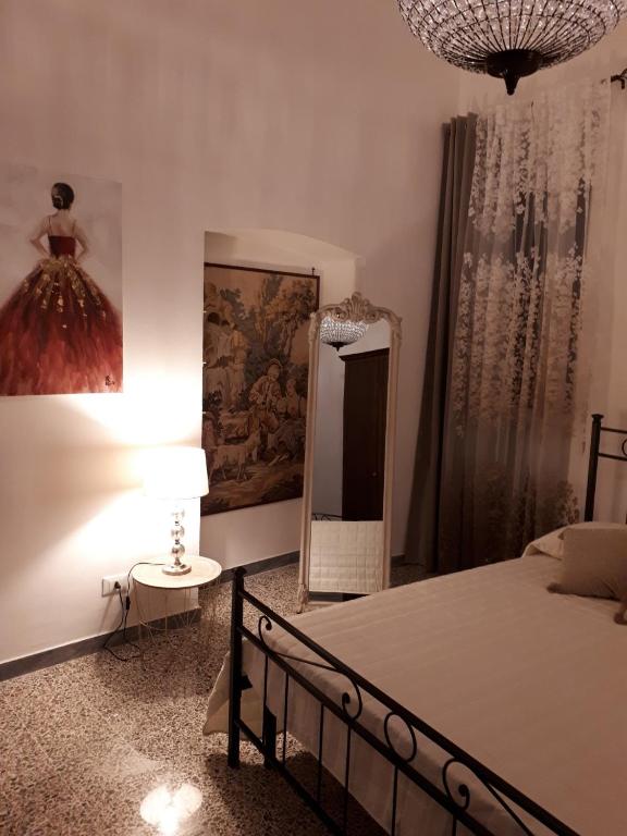 Posteľ alebo postele v izbe v ubytovaní LA CASA SOTTO IL CASTELLO