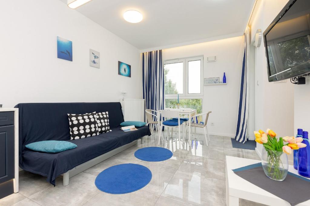 Posezení v ubytování Hugo Apartment by Noclegi Renters