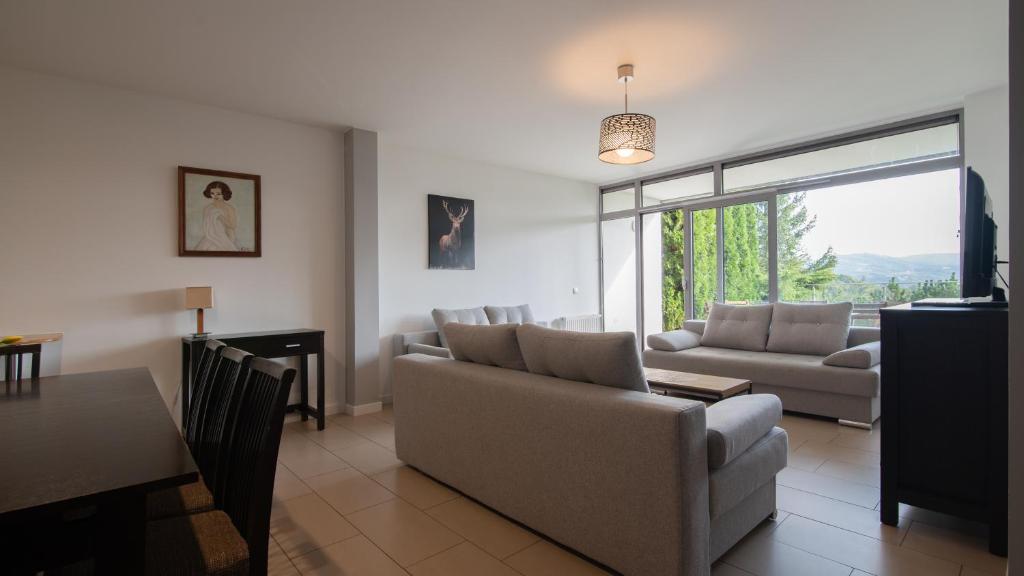 Posezení v ubytování Apartamenty Sun & Snow Bukowa Góra