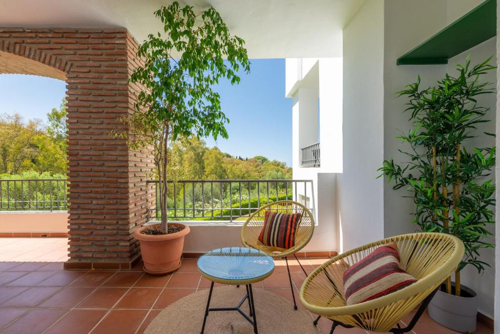 A balcony or terrace at Los Eucaliptos Appartement deux chambres Chez Stefan