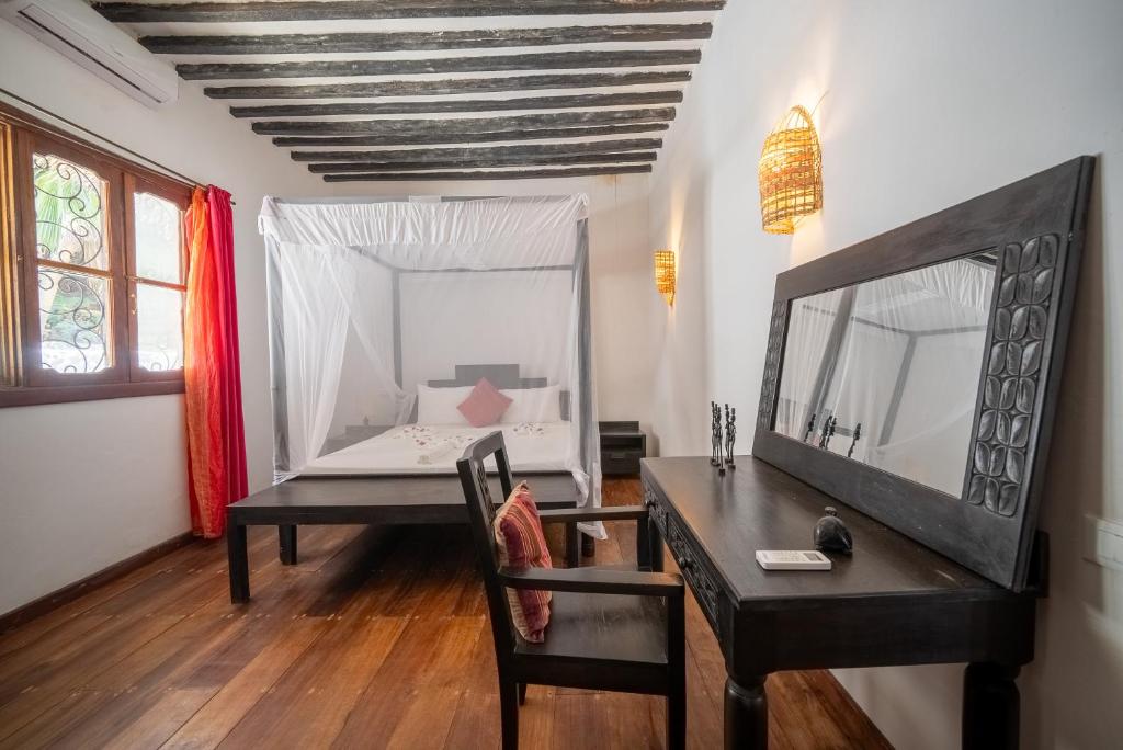 Postel nebo postele na pokoji v ubytování Beachfront Villa Hideaway ZanzibarHouses