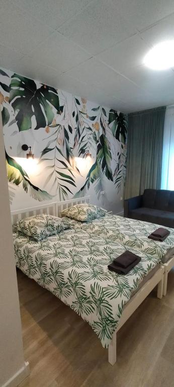 Posteľ alebo postele v izbe v ubytovaní Apartamenty Częstochowa