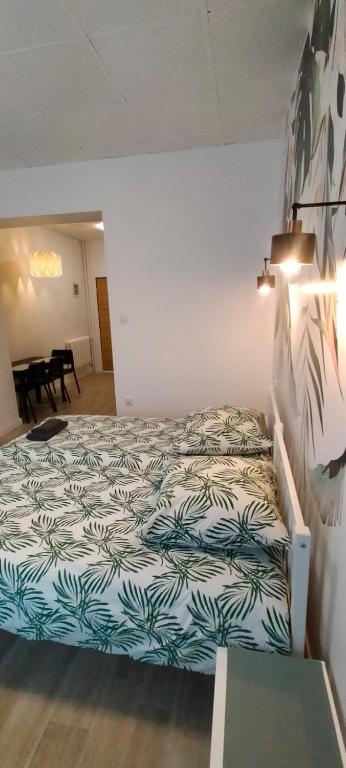Posteľ alebo postele v izbe v ubytovaní Apartamenty Częstochowa