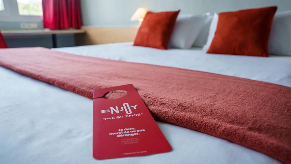 Postel nebo postele na pokoji v ubytování Ibis Alès Centre Ville