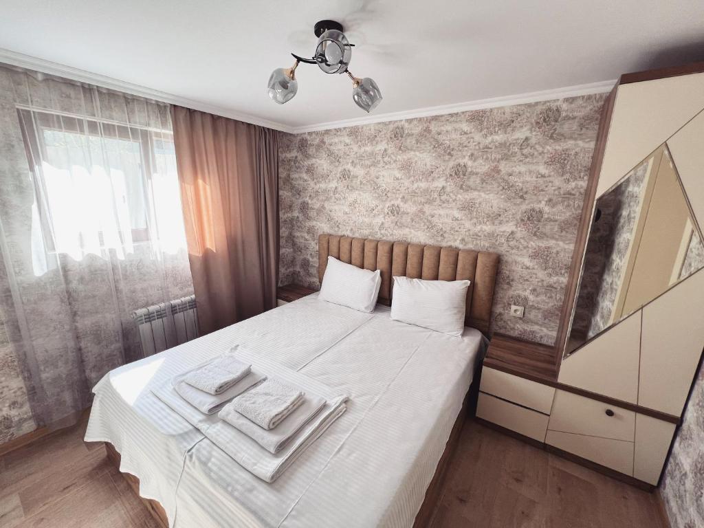 Postel nebo postele na pokoji v ubytování Gardenia
