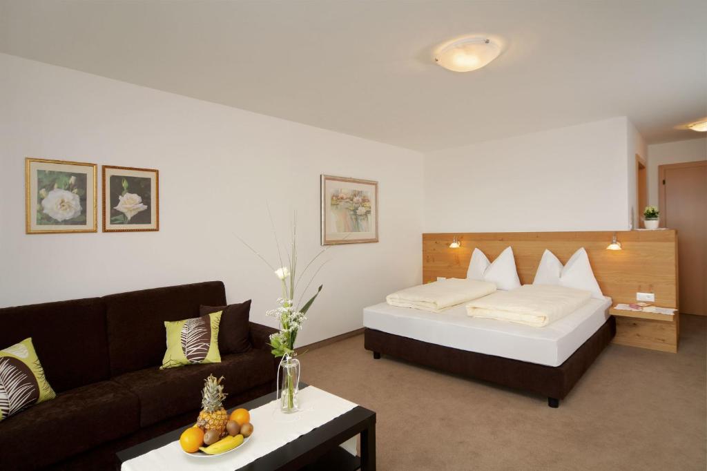 Postel nebo postele na pokoji v ubytování Hotel Garni Paler