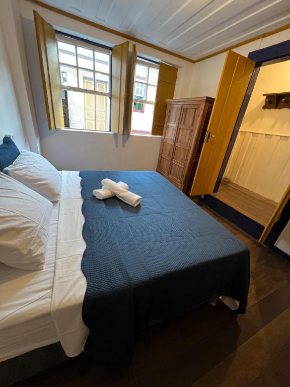 Postel nebo postele na pokoji v ubytování History Hostel