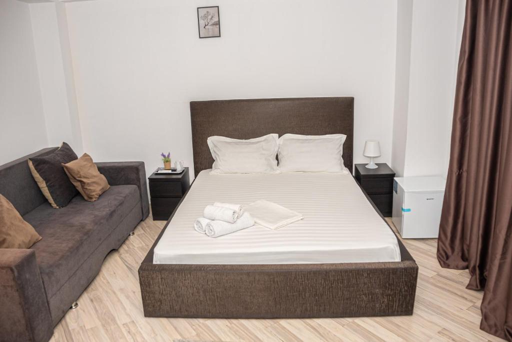 Postel nebo postele na pokoji v ubytování Occidental Wise Transit Hotel