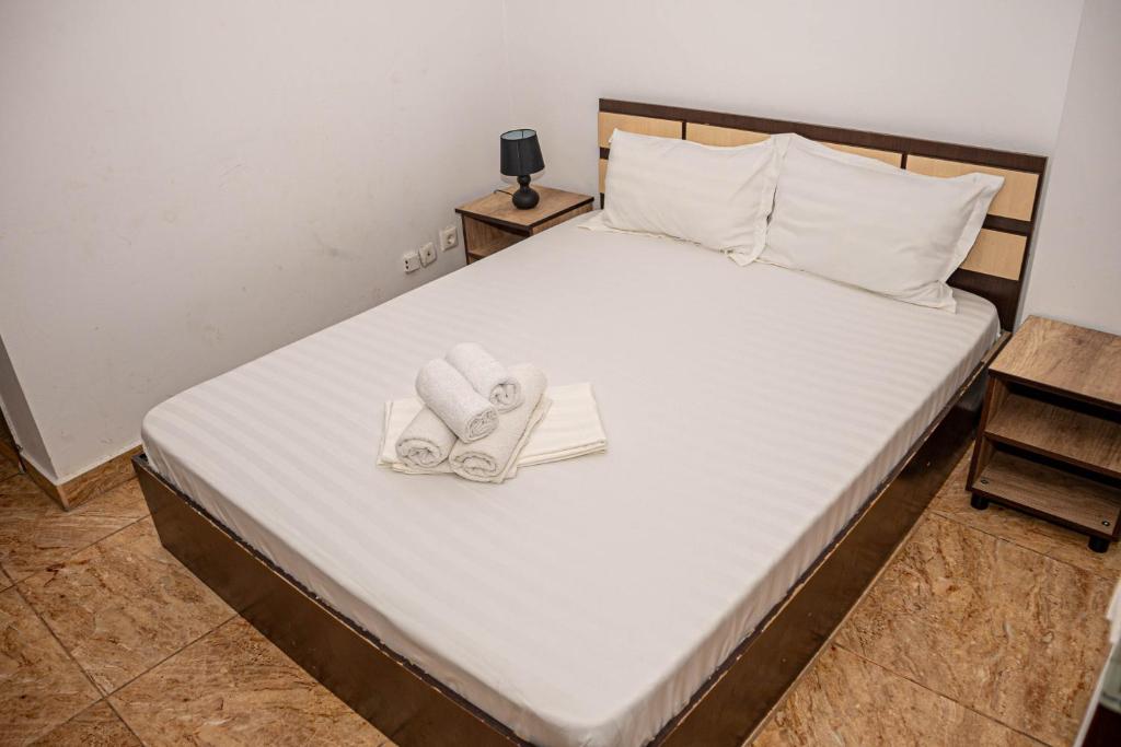 Postel nebo postele na pokoji v ubytování Occidental Wise Transit Hotel