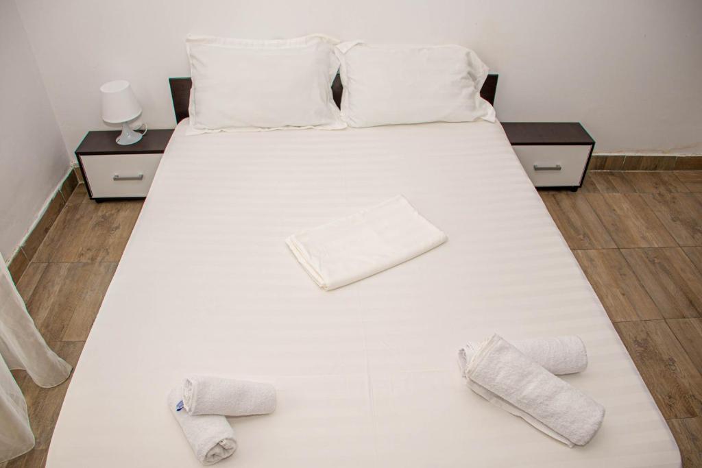 Postel nebo postele na pokoji v ubytování Occidental Wise Transit Hotel