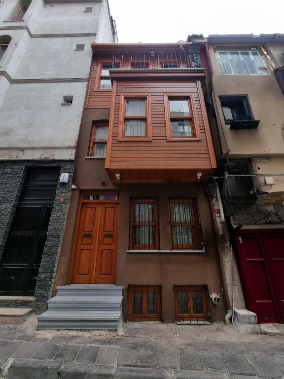 a building with orange doors on a street at HaciBayramApart in Istanbul