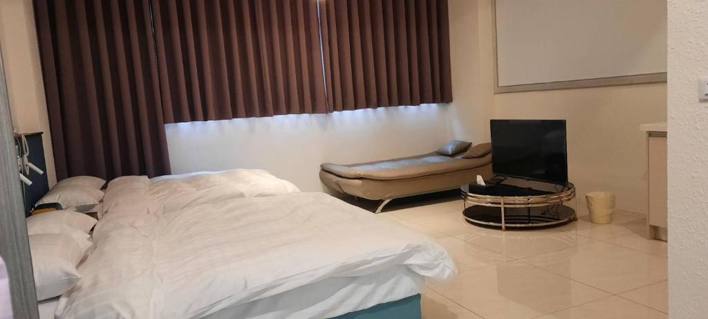 Postel nebo postele na pokoji v ubytování 111 Gukeng Homestay