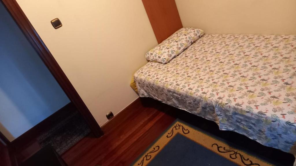 Een bed of bedden in een kamer bij Peñazcal casita feliz