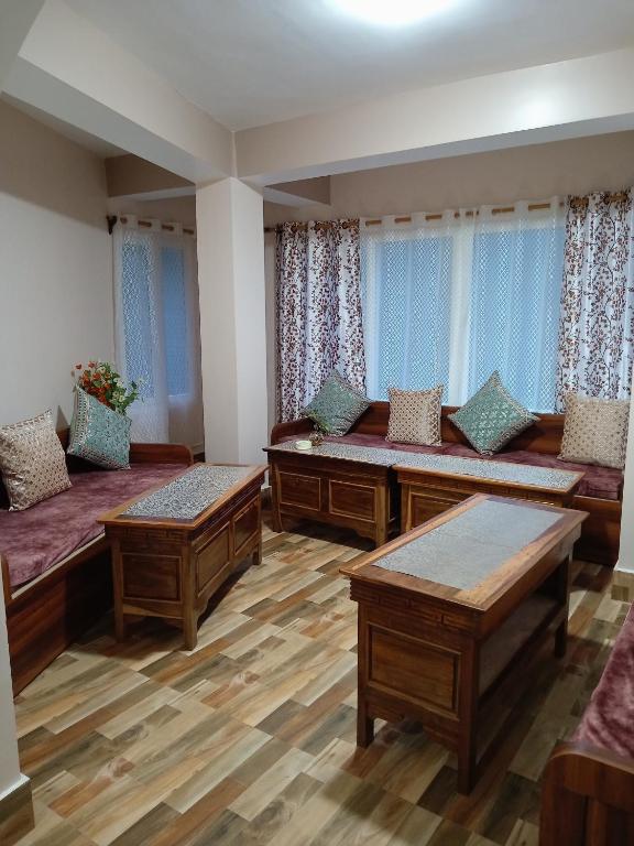 Postel nebo postele na pokoji v ubytování Tigerhill Homestay