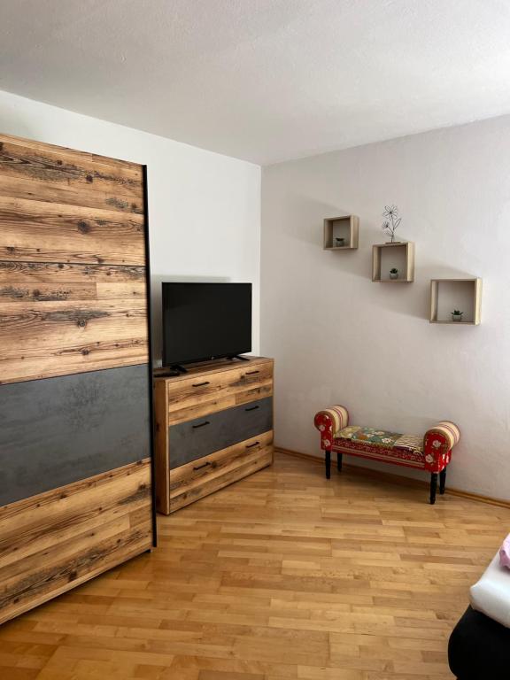 TV a/nebo společenská místnost v ubytování Ferienwohnung Eden