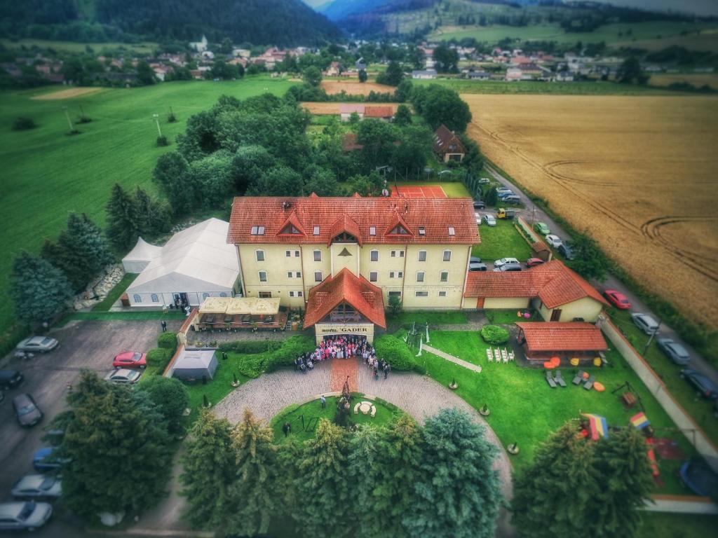 an aerial view of a large house with a garden at Hotel Gader a reštaurácia RaMarti in Blatnica