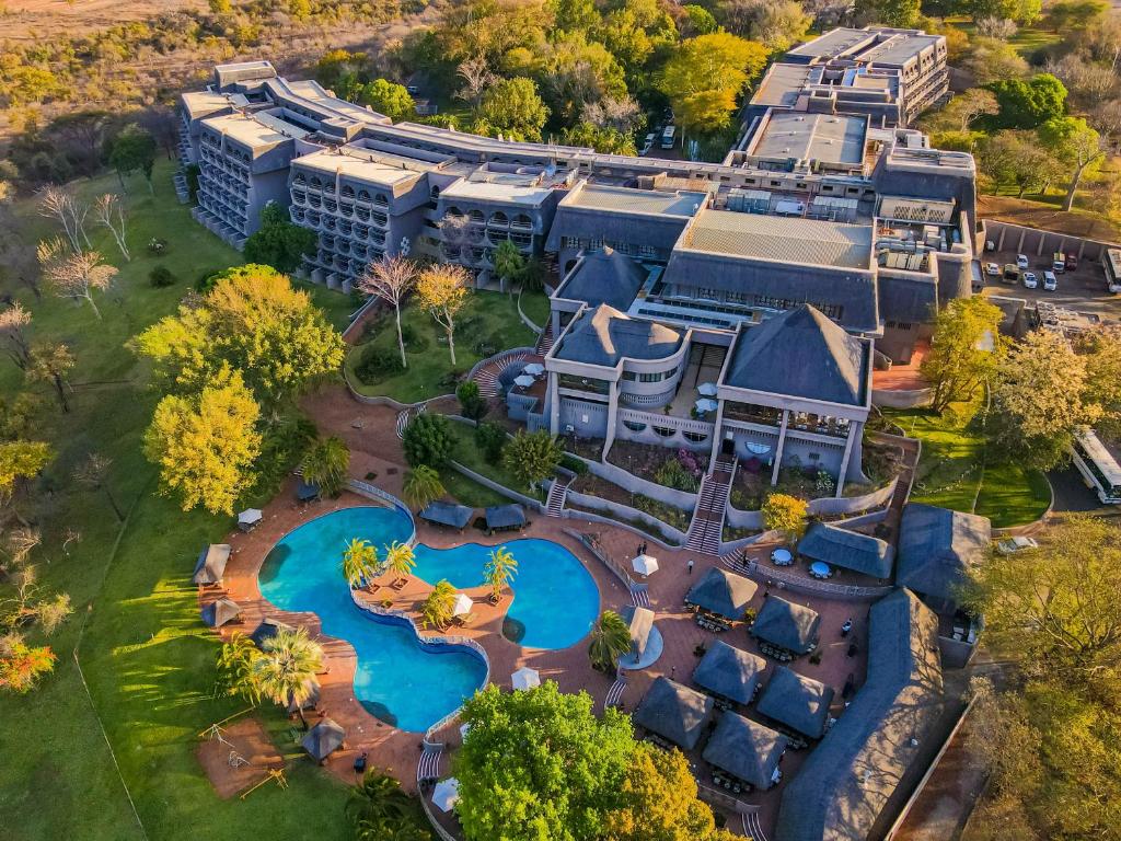 an aerial view of a resort with two swimming pools at Elephant Hills Resort in Victoria Falls