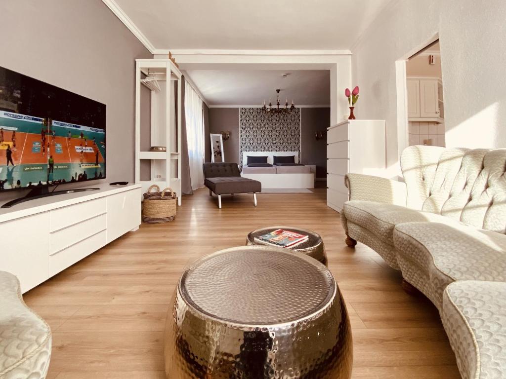 Μια τηλεόραση ή/και κέντρο ψυχαγωγίας στο CASA REHSE I Stilvolles Apartment I 24h-Self-Check-in I kostenlos Parken & WLAN I 55-Zoll-Smart&Kabel-TV I ÖPNV