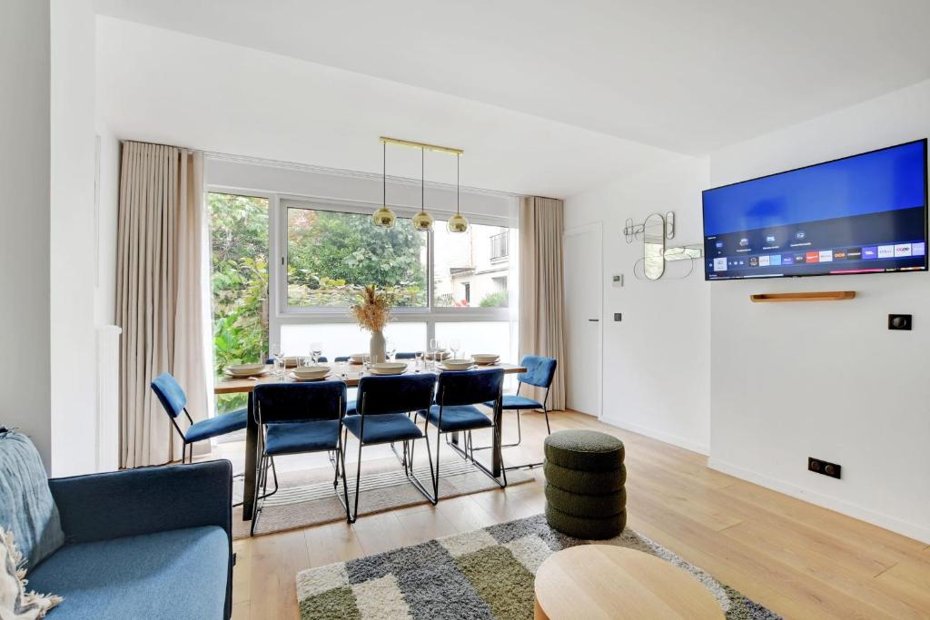 Televízia a/alebo spoločenská miestnosť v ubytovaní Incroyable appartement - 3BR-8P - Pl de la Nation