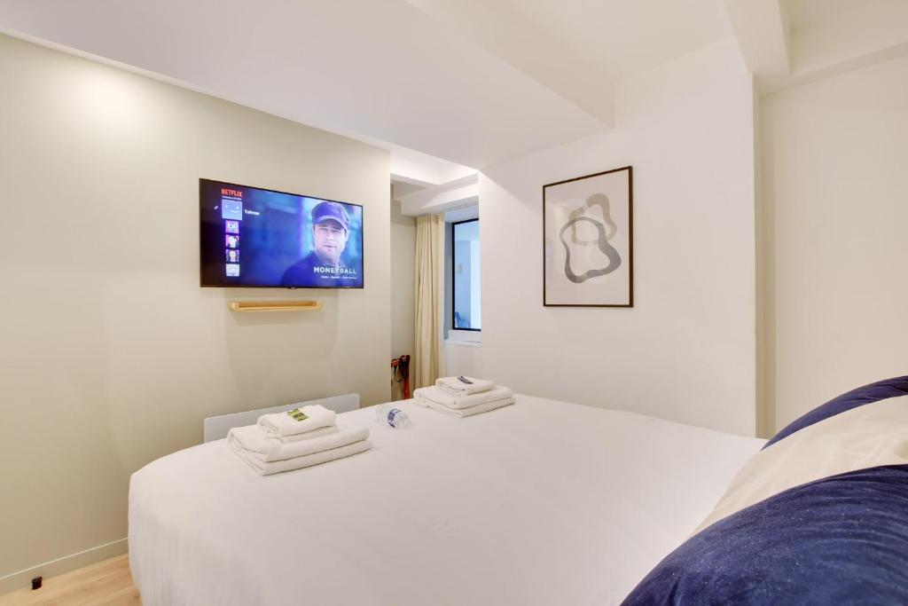 Posteľ alebo postele v izbe v ubytovaní Incroyable appartement - 3BR-8P - Pl de la Nation