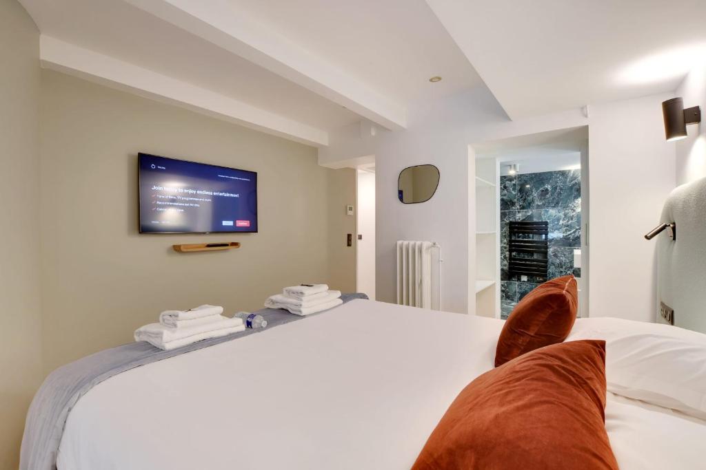 Posteľ alebo postele v izbe v ubytovaní Incroyable appartement - 3BR-8P - Pl de la Nation