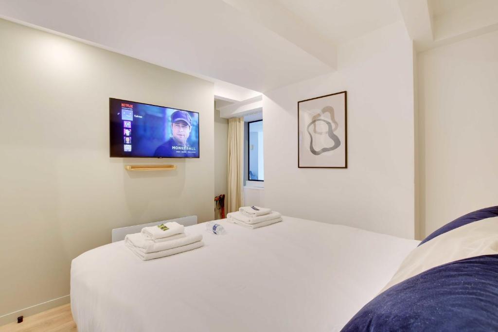 Posteľ alebo postele v izbe v ubytovaní Incroyable appartement - 3BR-8P - Pl de la Nation