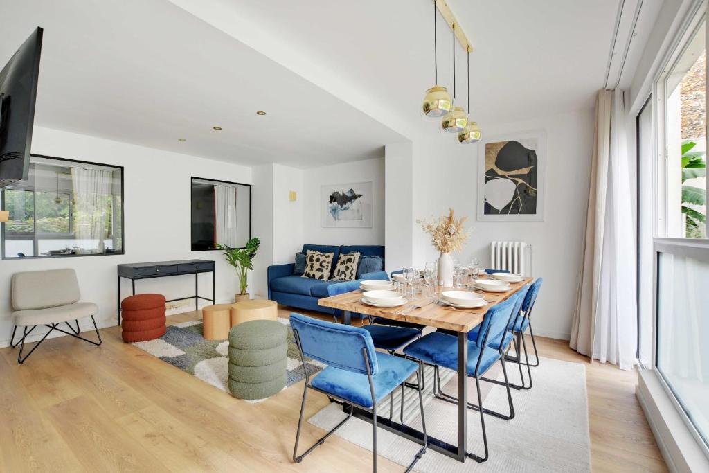 Televízia a/alebo spoločenská miestnosť v ubytovaní Incroyable appartement - 3BR-8P - Pl de la Nation