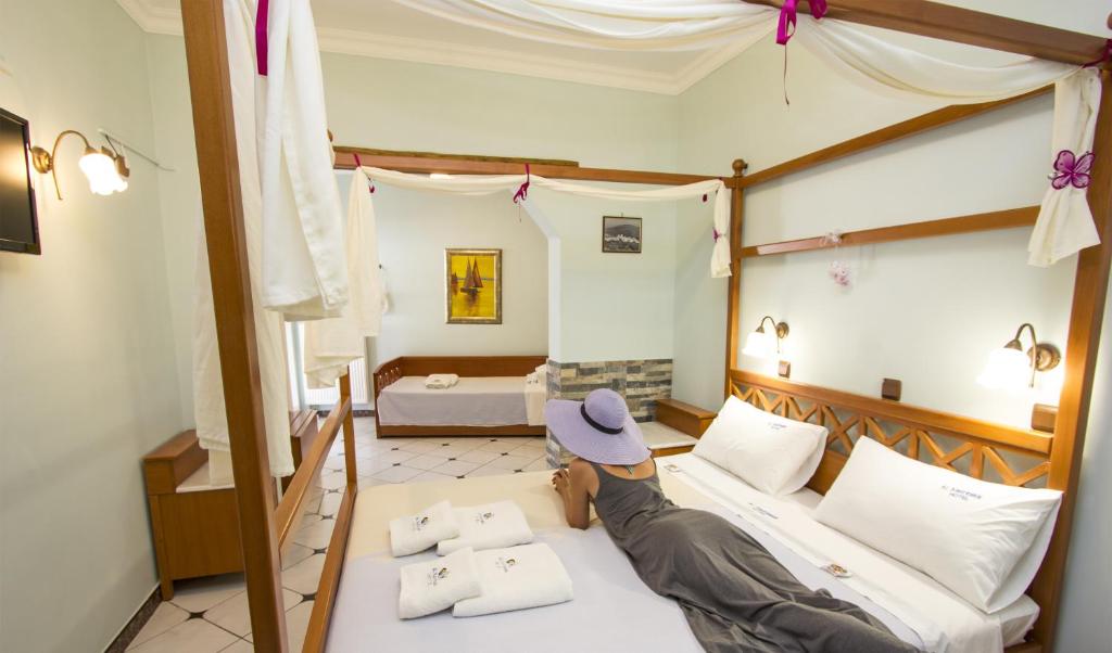 Postel nebo postele na pokoji v ubytování ALK Hotelᵀᴹ