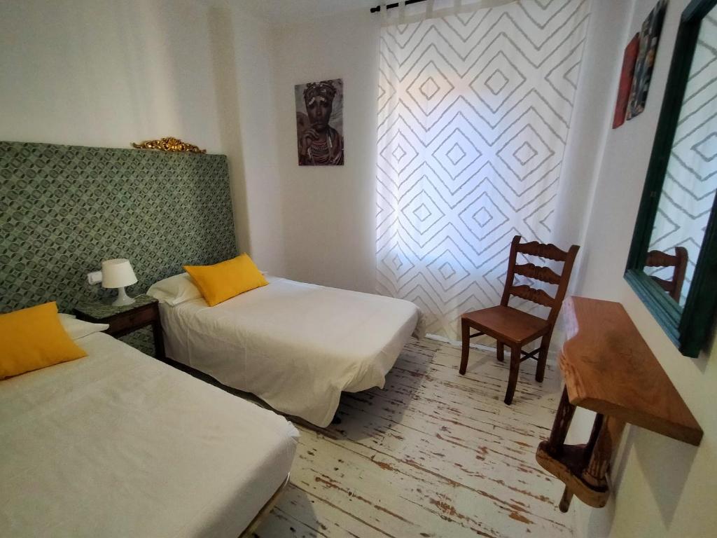A bed or beds in a room at Covaleda naturazleza y relax