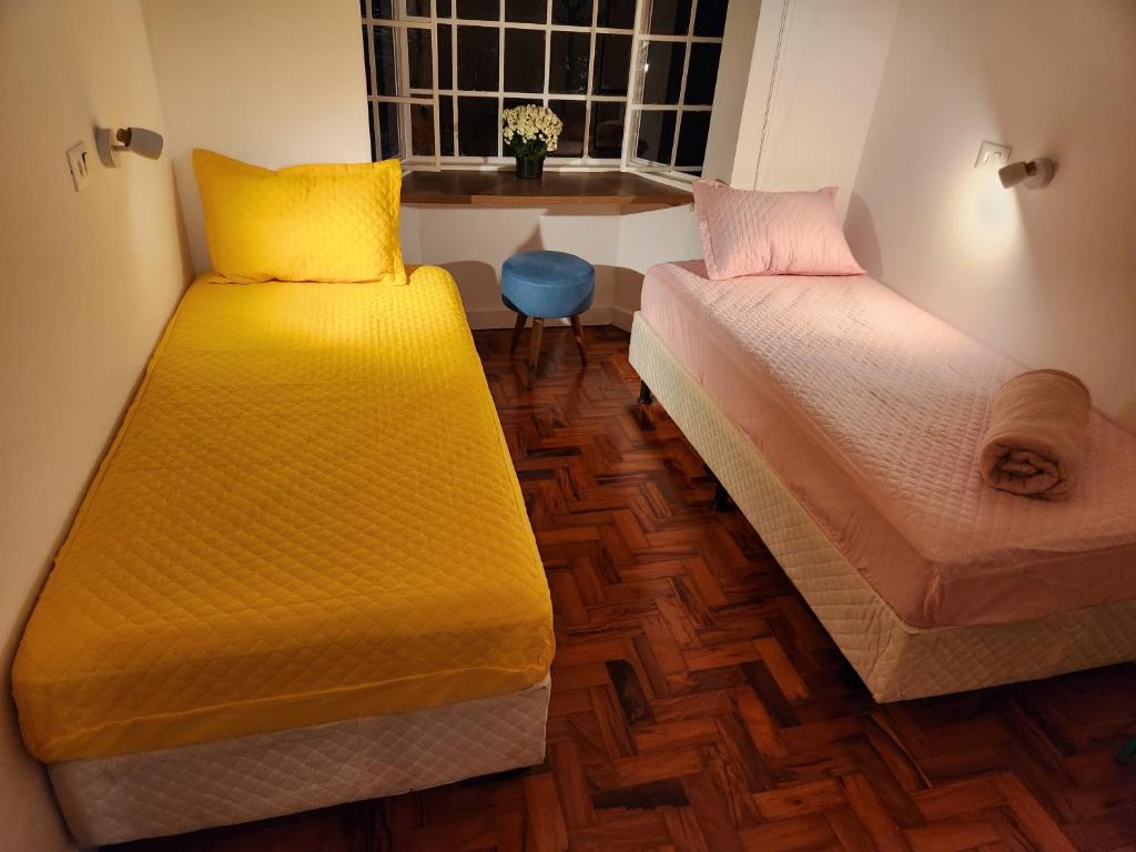 Voodi või voodid majutusasutuse Morada City Hostel toas