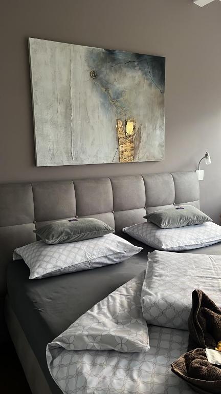 Łóżko lub łóżka w pokoju w obiekcie Gartenhof