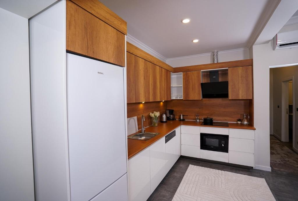 Kuchyň nebo kuchyňský kout v ubytování Merkuri apartments