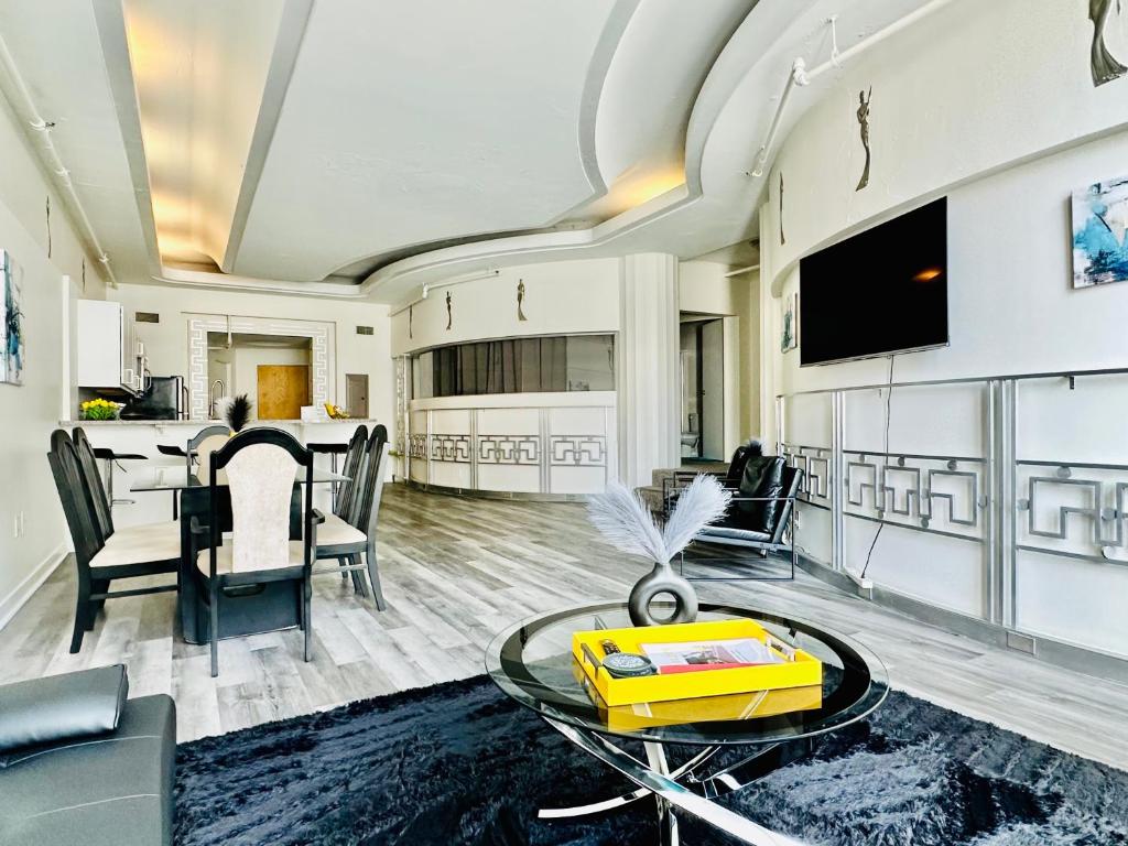 a living room with a table and a dining room at Executive Vacation Suite for 4 in Indianapolis