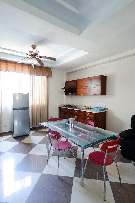 Kuchyň nebo kuchyňský kout v ubytování Aparta Hotel Roma