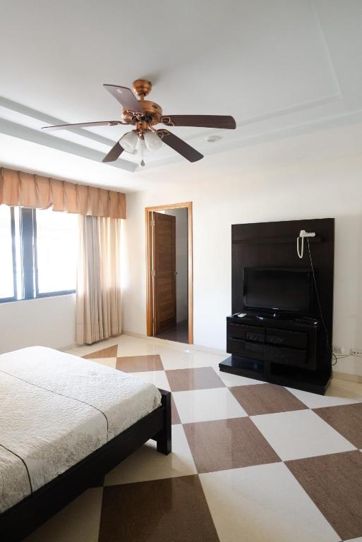 Postel nebo postele na pokoji v ubytování Aparta Hotel Roma
