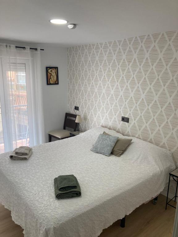 Postel nebo postele na pokoji v ubytování San Patricio 7