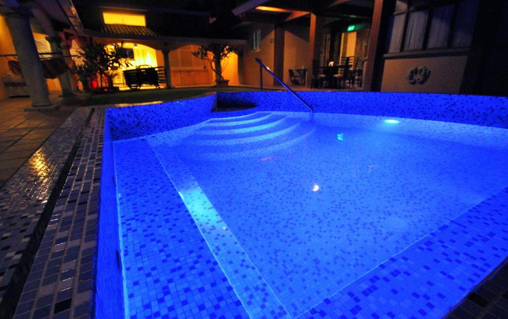 Bazén v ubytování Cedros Inn Boutique Hotel nebo v jeho okolí