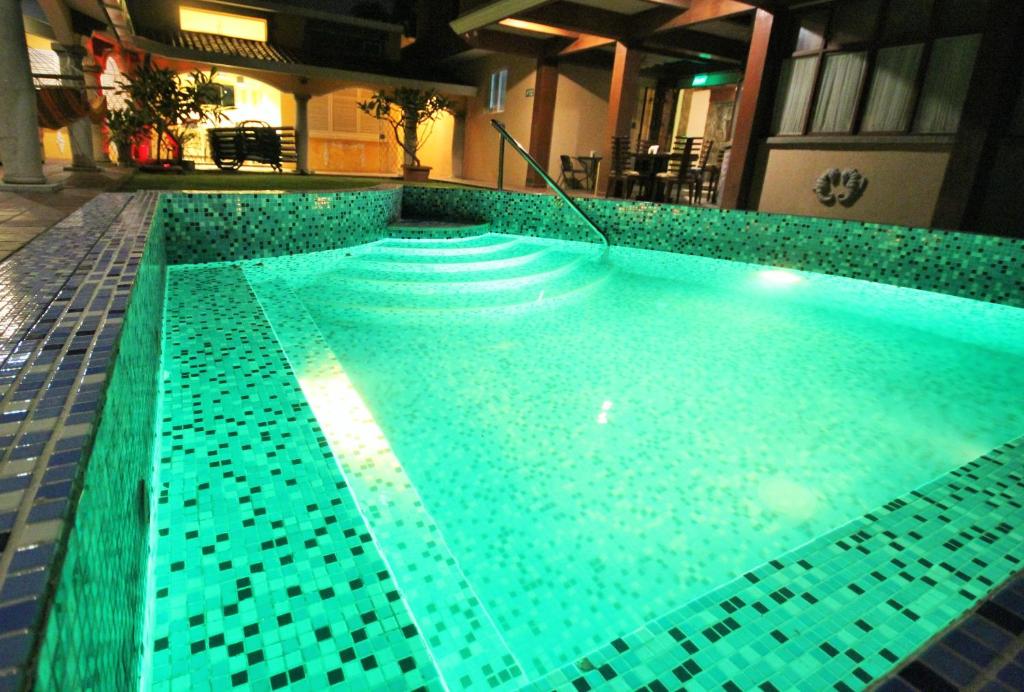 Bazén v ubytování Cedros Inn Boutique Hotel nebo v jeho okolí