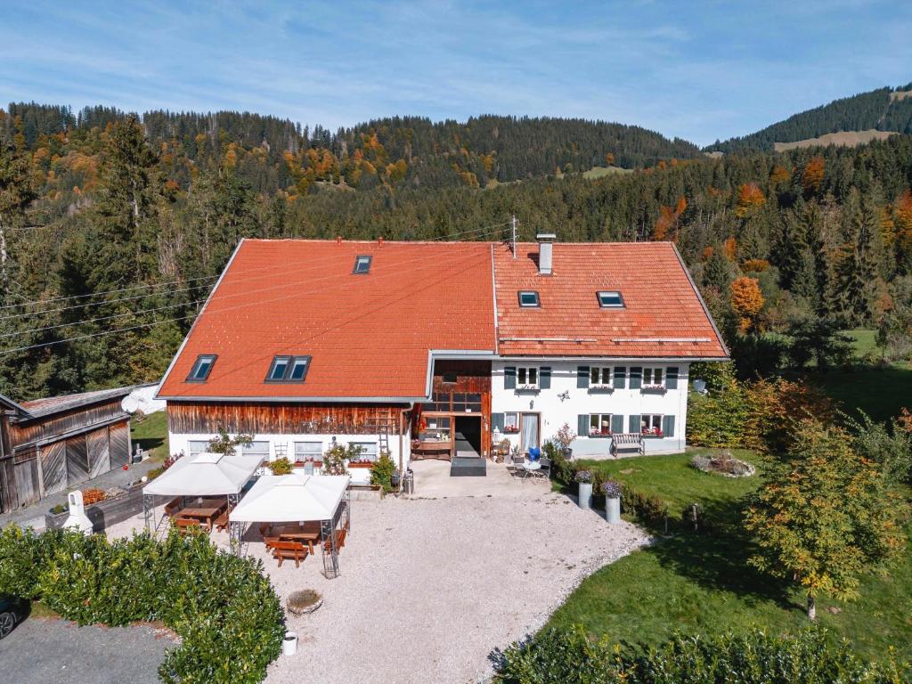 an aerial view of a house with an orange roof at Am Hof Jungholz in Jungholz