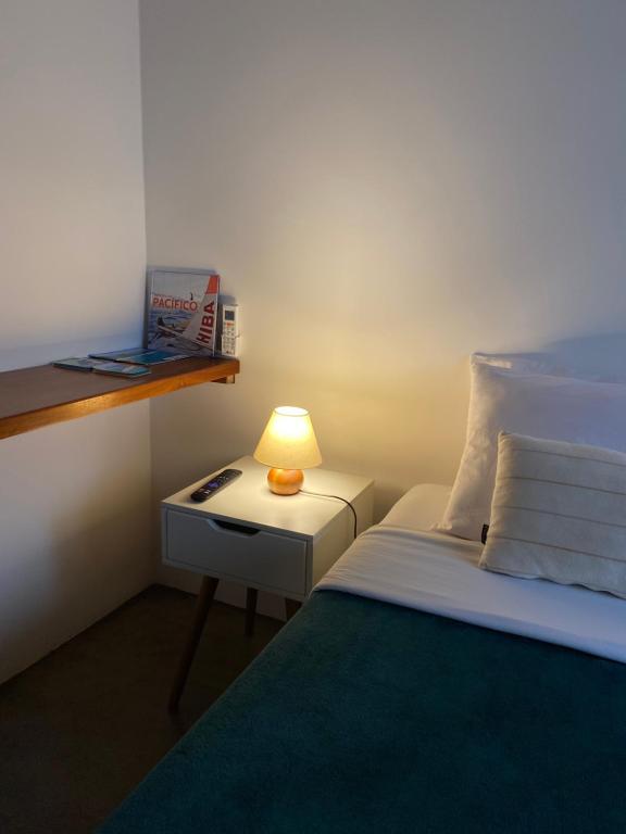 Postel nebo postele na pokoji v ubytování Ao Mar - Hospedagem