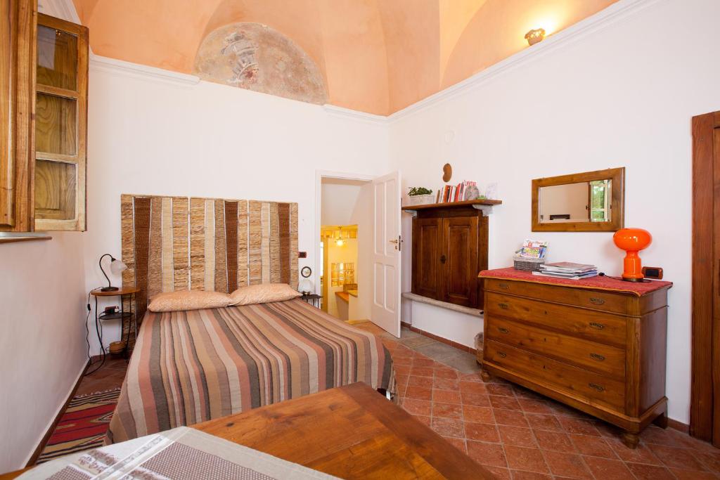 Postel nebo postele na pokoji v ubytování B&B Cascina Moncrava